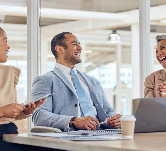 Happy business people, team and laughing in meeting for company update, planning or feedback review. Diversity, corporate group or office employees in collaboration, conversation with a funny joke